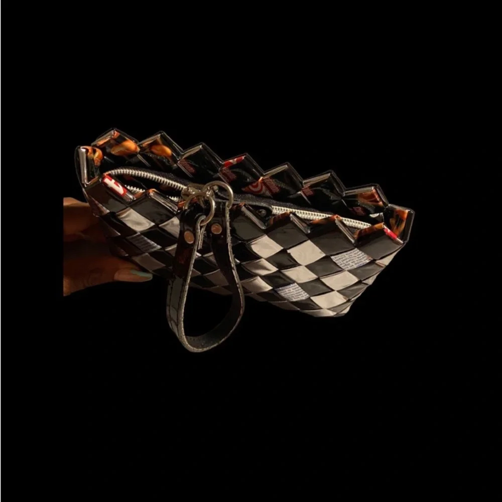 Nahui Ollin black and silver checker board wristlet
